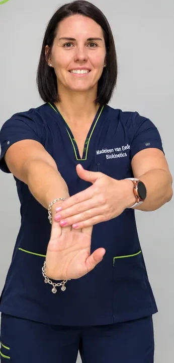 Madeleen demonstrating the wrist and forearm stretch